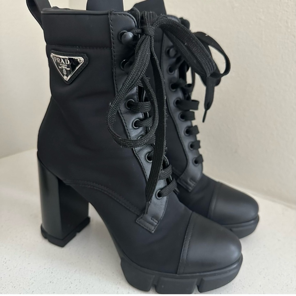 Prada nylon and leather ankle booties
4.33 in / 110 mm block heel